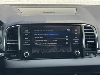 Škoda Karoq Skoda KAROQ 1.0 TSI Style Camera Clima Cruise Trekhaak Inductie laden Navigatie Keyless - afbeelding nr 29