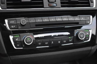 BMW 1 Serie BMW 1-serie M140i xDrive High Executive Pano Camera H/K Leder Elekstoel - afbeelding nr 26