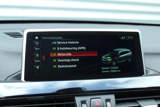 BMW X1 BMW X1 sDrive18i 141pk AUTOMAAT NL-Auto 74.942km Clima Cruise Navi Camera HUD Keyless El. Klep 17
