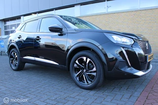 Peugeot 2008 Peugeot 2008 1.2 PureTech Allure, Digitaal dashboard, Pdc voor/achter + camera, App connect, Donker glas, Cruise, Clima, Navi, Full led. - afbeelding nr 11