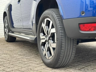Dacia Duster Dacia DUSTER 1.3 TCe Extreme Automaat Camera Navigatie Carplay Clima Cruise Leder - afbeelding nr 16