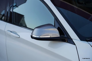 BMW 1 Serie BMW 1-serie M140i LCI2 | Schuifdak | Navi Pro | 719M | M Sport onderstel | Zaero diffuser | Alpinweiss - afbeelding nr 10