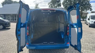 Ford Transit Custom Ford Transit Custom 320 2.0 TDCI L2H1 Limited SCI 136pk Automaat 17 inch | Adaptive cruise control | Dubbele schuifdeur | Inklapbare trekhaak | Verwarmbaar stuurwiel | 6B&O speakers | Dual zone clima - afbeelding nr 5