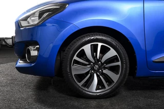 Suzuki Swift | Adapt. Cruise |Stoelverw. | Camera | NAV + App. Connect | ECC | Afn. Trekhaak | LM 16