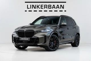 BMW X5 xDrive50e | SOH 91% | Uniek | M Sport | Pano | H&K | Massage | Trekhaak | 22 inch | NL auto |