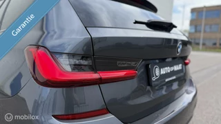 BMW 3 Serie BMW 330i Touring High Executive | M Pakket | Shadowline | H&R | Standkachel | Display Key - afbeelding nr 20