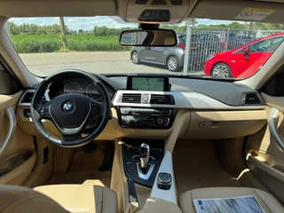 BMW 3 Serie BMW 3-serie 320i High Executive 184 PK / PDC / NAVIGATIE / CRUISE / NL AUTO / LEDER / AUTOMAAT - afbeelding nr 2