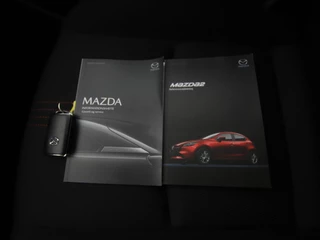 Mazda 2 Mazda 2 1.5 SkyActiv-G Homura automaat met all-weather banden : dealer onderhouden - afbeelding nr 36