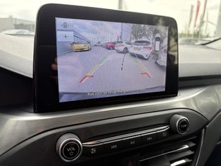 Ford Focus Ford Focus Wagon 1.0 EcoBoost Titanium Wagon | Winter Pack | Adaptive cruise control | Camera | Navigatie | 17 inch | Reservewiel - afbeelding nr 30