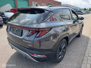 Hyundai Tucson Hyundai Tucson 1.6 T MHEV BlackLine 4WD Automaat , Trekhaak 1.650kg Trekgewicht ,  Panorama Dak , Stoel & Stuur verwarming ,  Navigatie & Camera , Parkeerhulp voor & achter, Keyless entry , Electr Achter klep , IQ telefoonlader - afbeelding nr 5