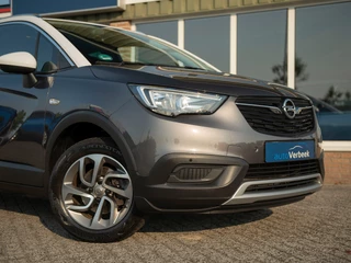 Opel Crossland X | Navi & Apple Carplay/Android Auto | PDC + Camera | Stoel-/Stuurverwarming | Ind. telefoonlader | Verkeersbord herkenning - afbeelding nr 23