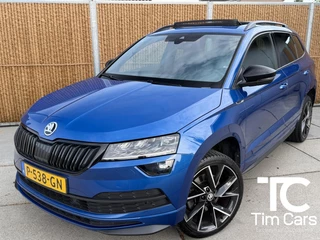 Škoda Karoq 1.5 TSI ACT Sportline Business Automaat Panoramadak | Trekhaak uitklapbaar | Adaptieve cruise control | Stoelverwarming | Climate control | LED verlichting | Canton audio | Apple CarPlay/Android Auto | Achteruitrijcamera