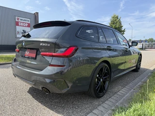 BMW 3 Serie BMW 3 Serie Touring 330e M-Sport DRAVITGRAU PANO/LASER/HEAD-UP/ADAPTIVE M-ONDERSTEL/KEYLESS/19