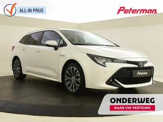 Toyota Corolla Touring Sports 2.0 Hybrid Business Plus | Stoelverw. | Trekhaak | PDC V+A |