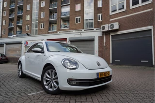 Volkswagen Beetle 1.2 TSI Exclusive Allstar | LEER | NAVI | XENON + LED | Parkeersensoren voor en achter |