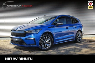 Škoda Enyaq iV 80 Sportline // Trekhaak | Race Blue | Warmtepomp | 94% SoH | Sfeerverlichting | Camera | Matrix LED