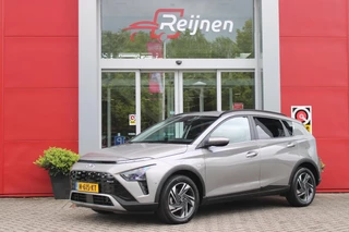 Hyundai Bayon Hyundai Bayon 1.0 T-GDI 100PK AUTOMAAT PREMIUM | ACHTERUITRIJ CAMERA | CLIMATE CONTROL | SFEER VERLICHTING | LED KOPLAMPEN | BOSE AUDIO | STOEL/STUUR VERWARMING | DODEHOEK DETECTIE | KEYLESS ENTRY/START | PARKEERSENSOREN VOOR EN ACHER | APPLE CARPLAY/ANDROID AUTO | DRAADLOZE TEEFOONLADER | - afbeelding nr 1