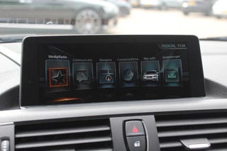 BMW 1 Serie BMW 1 Serie 118i High Exe. M Sport / Schuifdak / Camera / Leder / 18'' / Navigatie / Sportstoelen / Stoelverwarming / DAB / Cruise Control - afbeelding nr 12