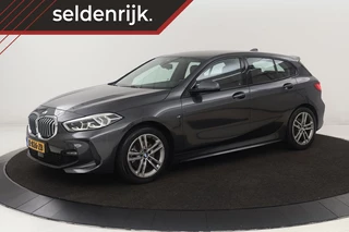 BMW 1 Serie BMW 1-serie 116i High Executive | M Sport | Leder |  Stoelverwarming | Carplay | Full LED | Sportstoelen | Navigatie | Climate control | Live Cockpit | Parkeerhulp | Cruise control - afbeelding nr 1