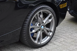BMW 1 Serie BMW 1-serie M140i xDrive High Executive Pano Camera H/K Leder Elekstoel - afbeelding nr 47