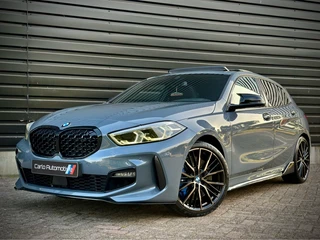 BMW 1 Serie BMW 1 Serie 118i M135 M-PERF. PANO|SCHAALSTOEL|HUD|H/K|CAMERA - afbeelding nr 1