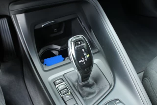 BMW X1 BMW X1 sDrive18i 141pk AUTOMAAT NL-Auto 74.942km Clima Cruise Navi Camera HUD Keyless El. Klep 17