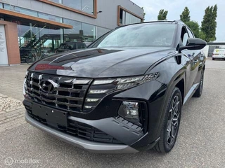 Hyundai Tucson Hyundai Tucson 1.6 T  PHEV N Line Sky 4WD  65km Electr rijden  hierna Hybride , N-Line Luxe uitvoering Panorama Schuif / Kantel dak  , Dodehoek directie , 360o camera , Navigatie , Electr voorstoelen - afbeelding nr 11