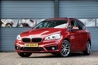 BMW 2 Serie BMW 2-serie Active Tourer 218i Sportline /LED/PANODAK/HUD/CAMERA/GROOT-NAVI/ACC/STOELVERW.! - afbeelding nr 1