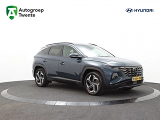 Hyundai Tucson Hybrid - 265677391-0