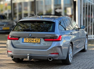 BMW 3 Serie BMW 3-serie Touring 320e Nieuwstaat AUT Pano Plug in hybrid Wide screen Elek.Trekhaak Stoelverwarming Adaptive LED - afbeelding nr 29