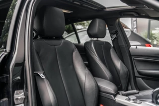 BMW 1 Serie BMW 1-serie M140i xDrive Harman Kardon Dak Leer - afbeelding nr 34