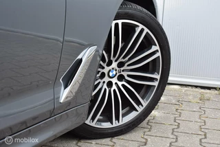 BMW 5 Serie BMW 520i Touring M-Sport Bluestone Pano Comfortstoel 360°Camera HUD Leder HiFi Adaptive LED 19