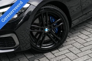 BMW 1 Serie BMW 1-serie M140i xDrive Harman Kardon Dak Leer - afbeelding nr 15