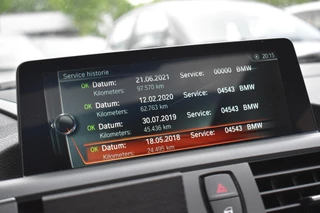 BMW 1 Serie BMW 1-serie M140i xDrive High Executive Pano Camera H/K Leder Elekstoel - afbeelding nr 34