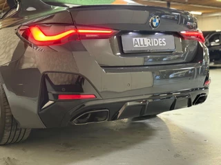BMW 4 Serie BMW 4-serie Gran Coupé M440i xDrive High Executive | Schuif-kanteldak | Harman/Kardon | Laserlight | 360 camera | HUD - afbeelding nr 11