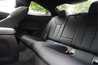BMW 4 Serie BMW 4 Serie Coupé M440i xDrive High Executive | M-SPORT | SAN REMO GRUN | Panoramadak | Harman Kardon | Head Up Display | Adaptieve demping | APPLE CarPlay | 360 graden Camera - afbeelding nr 20