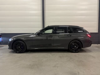 BMW 3 Serie BMW 3 Serie Touring 330e M-Sport DRAVITGRAU PANO/LASER/HEAD-UP/ADAPTIVE M-ONDERSTEL/KEYLESS/19