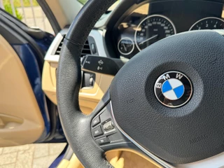 BMW 3 Serie BMW 3-serie 320i High Executive 184 PK / PDC / NAVIGATIE / CRUISE / NL AUTO / LEDER / AUTOMAAT - afbeelding nr 16