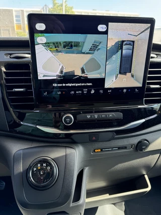 Ford E-Transit Ford E-Transit 350 L2H3 Trend 68 kWh Zuid | 184pk | Pro Power on board | Navigatie | Hoog Dak | Adaptieve Cruise | Digitale binnenspiegel | Keyless entry | Laadruimte bescherming | All season banden | Reservewiel | Perimetrisch alarm - afbeelding nr 15
