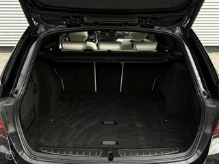 BMW 3 Serie BMW 3-serie Touring 320d High Executive M Sport Panoramadak Trekhaak HUD LED ACC Individual Shadow Line Camera 19