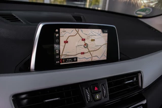 BMW X1 ➡️ BMW X1 sDrive18i F48 Executive | 2e eigenaar | Trekhaak | Sportstuur | DAB | Navi | PDC | Cruise-control | Climate | 140 pk | Automaat | 17 inch | Bluetooth | - afbeelding nr 25