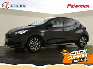 Toyota Yaris 1.5 Hybrid Lounge | Carplay | Panorama | Halfleer |