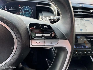 Hyundai Tucson Hyundai Tucson 1.6 T MHEV BlackLine 4WD Automaat , Trekhaak 1.650kg Trekgewicht ,  Panorama Dak , Stoel & Stuur verwarming ,  Navigatie & Camera , Parkeerhulp voor & achter, Keyless entry , Electr Achter klep , IQ telefoonlader - afbeelding nr 23