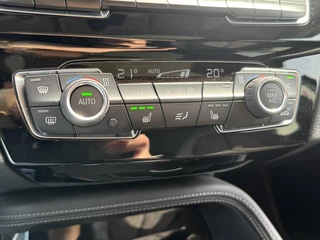BMW X1 BMW X1 SDrive18i High Executive Trekhaak Navigatie Led verlichting Clima Cruise Panorama - afbeelding nr 24