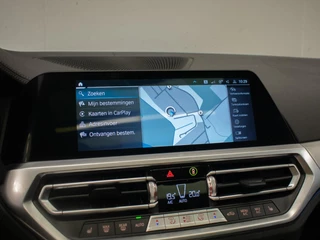 BMW 3 Serie BMW 3-serie Touring 320e M Sport (PANORAMADAK,APPLE CARPLAY,NAVI,SFEERVERLICHTING,STOELVERWARMING,CAMERA,LEDER,CRUISE,CLIMATE) - afbeelding nr 14