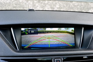 BMW X1 Rijklaarprijs-Garantie Panorama dak Leder Xenon Navigatie - afbeelding nr 19