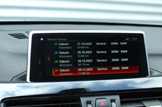 BMW X1 BMW X1 sDrive18i 141pk AUTOMAAT NL-Auto 74.942km Clima Cruise Navi Camera HUD Keyless El. Klep 17