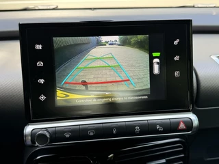 Citroën C4 Cactus Citroen C4 Cactus 1.2 PureTech Shine 110pk Navigatiesysteem | Climate control | Cruise control | Multifunctioneel stuurwiel | Trekhaak | Isofix | Getint glas | Inparkeerhulp | Parkeersensoren voor en achter | Achteruitrijcamera - afbeelding nr 23