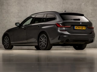 BMW 3 Serie BMW 3 Serie Touring 330e xDrive M Sport 293Pk Automaat (PANORAMADAK, M PAKKET, LASER KOPLAMPEN, MEMORY SEATS, HEAD-UP DISPLAY, HARMAN/KARDON, 360 CAMERA, ADAPTIVE CRUISE, APPLE CARPLAY, NIEUWE APK, NIEUWSTAAT) - afbeelding nr 3