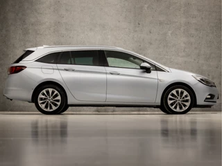 Opel Astra Opel Astra Sports Tourer 1.4 Innovation 150Pk Automaat (APPLE CARPLAY, GROOT NAVI, CLIMATE, CAMERA, LEDER, SPORTSTOELEN, ADAPTIVE CRUISE, PARKEERSENSOREN, LANE ASSIST, NIEUWE APK, NIEUWSTAAT) - afbeelding nr 4